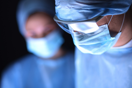 Team surgical assistant at work in operating